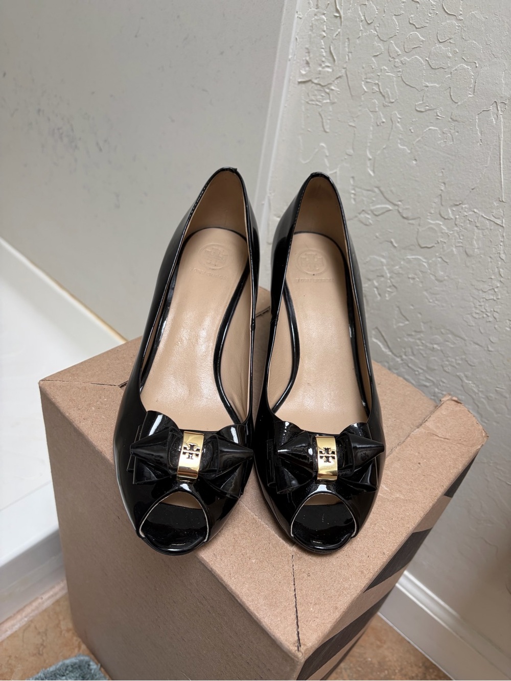 Tory Burch Black Patent Peep-Toe Pumps with Bow and Gold Logo